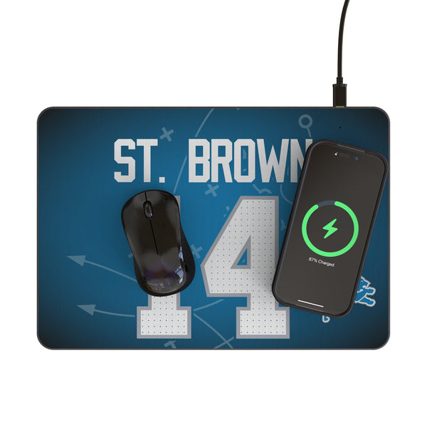 Amon-Ra St. Brown Detroit Lions 14 Game Tactic 15-Watt Wireless Charger and Mouse Pad Lifestyle.Jpg