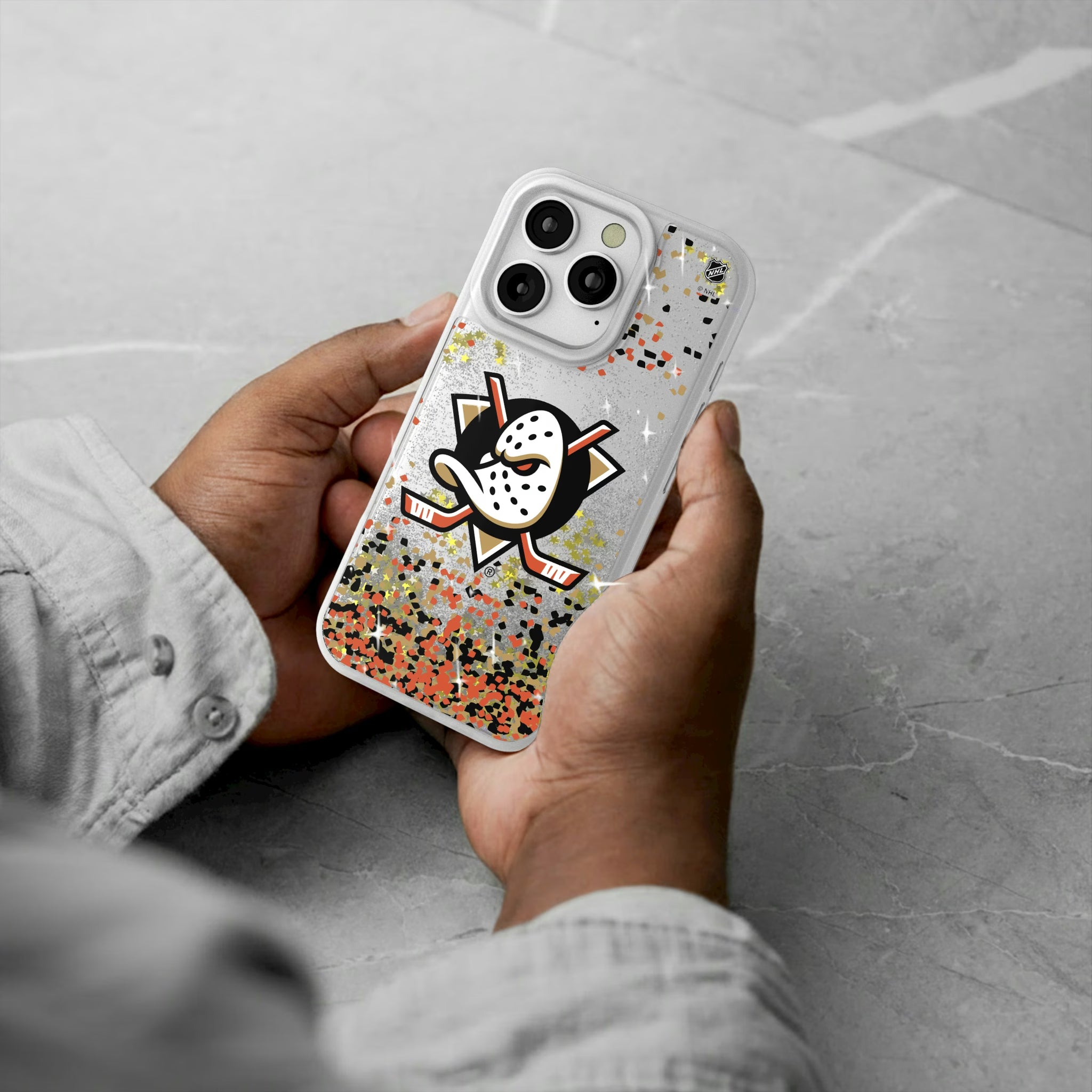 Anaheim Ducks Confetti iPhone Glitter Phone Case for Apple iPhone - Lifestyle#Device_iPhone 16 Pro