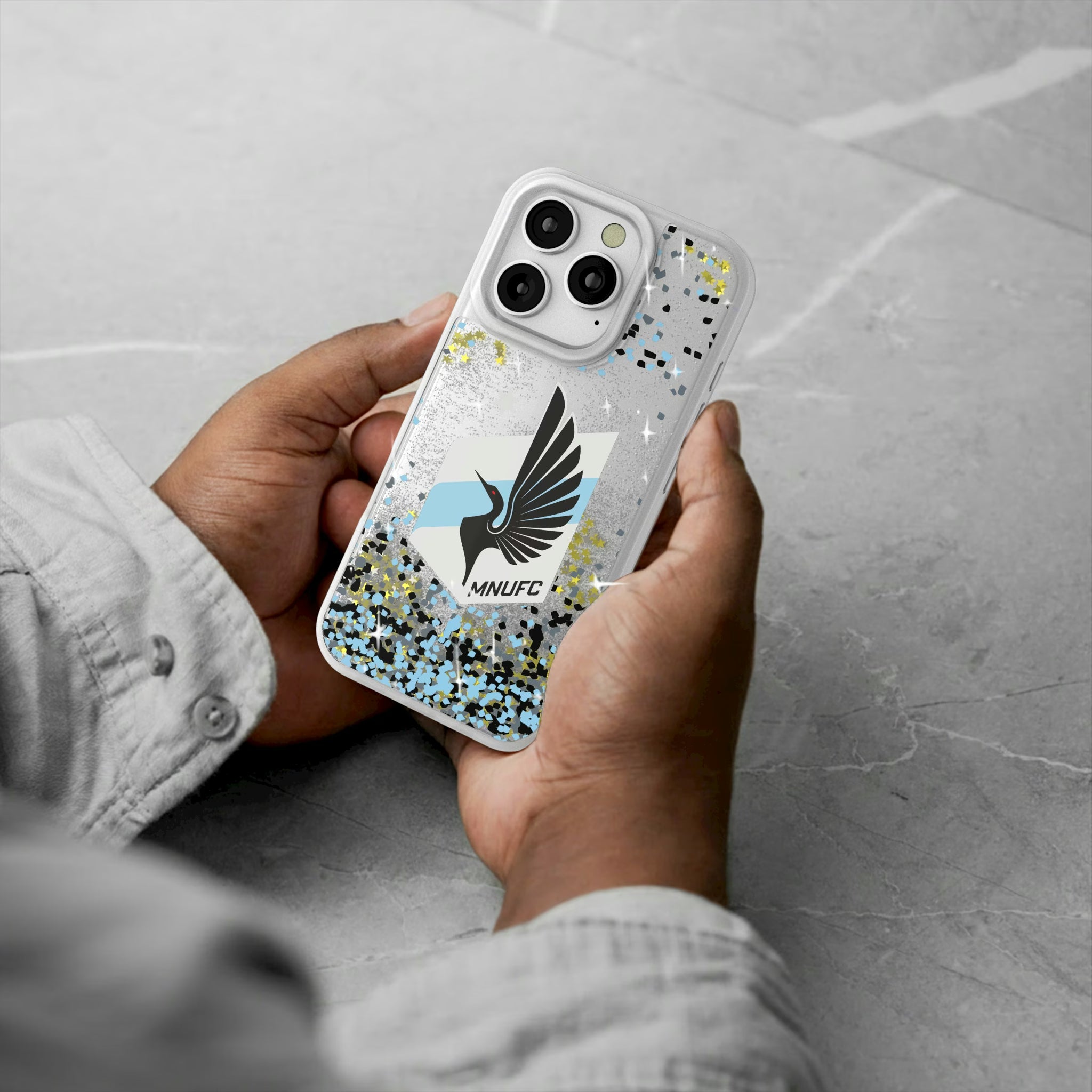 Minnesota United FC Confetti iPhone Glitter Phone Case for Apple iPhone - Lifestyle#Device_iPhone 16 Pro