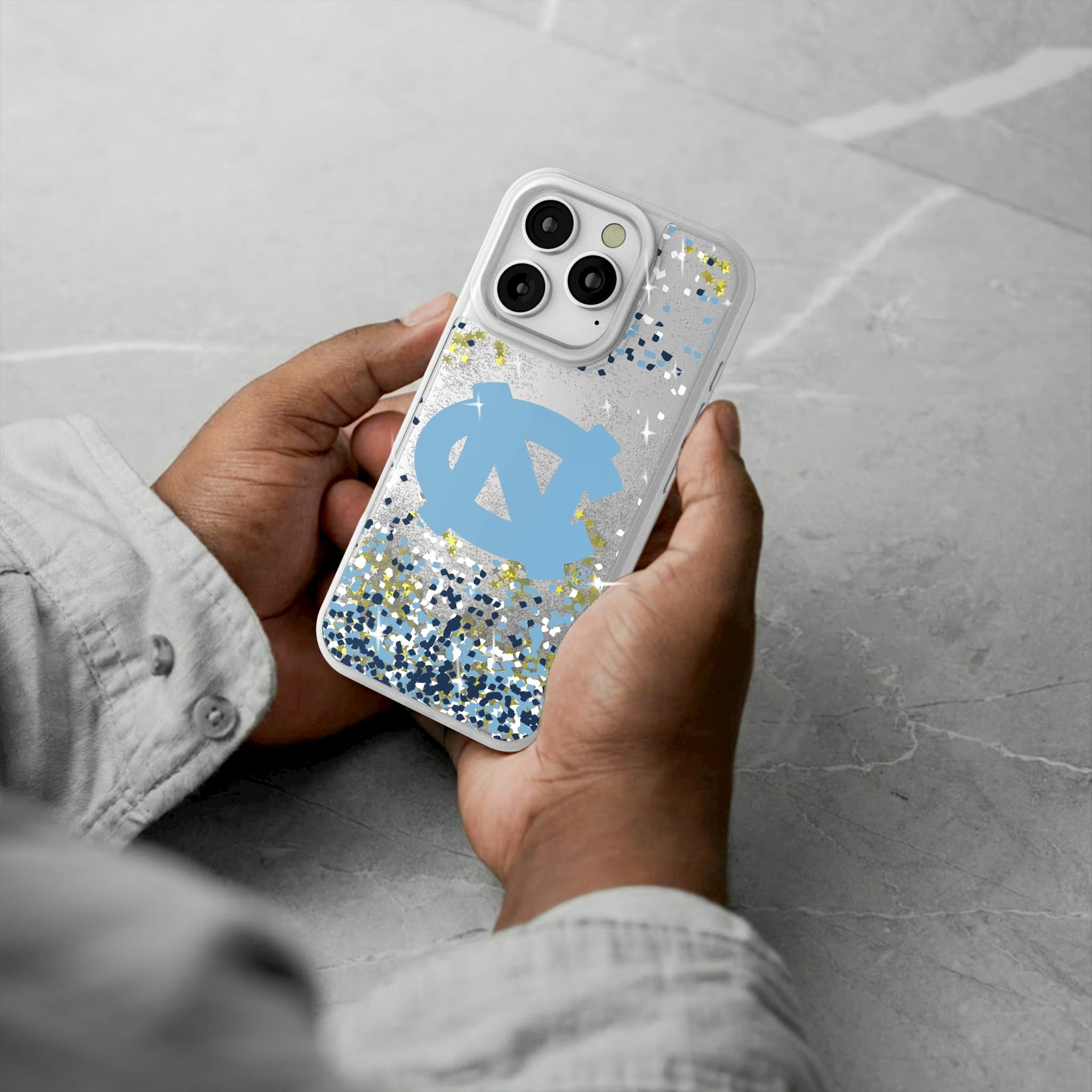 University of North Carolina Tar Heels Confetti iPhone Glitter Phone Case for Apple iPhone - Lifestyle#Device_iPhone 16 Pro